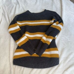 Lightly worn knitted sweater
